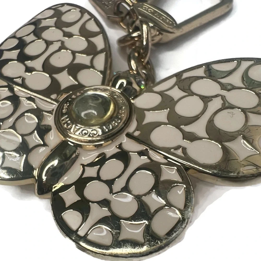 Coach Butterfly White and Gold Enamel Metal Keychain Fob Charm Rare
